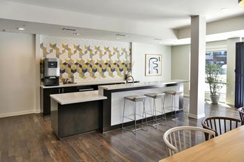 24 Hour coffee bar with coffee machine and large kitchen island
